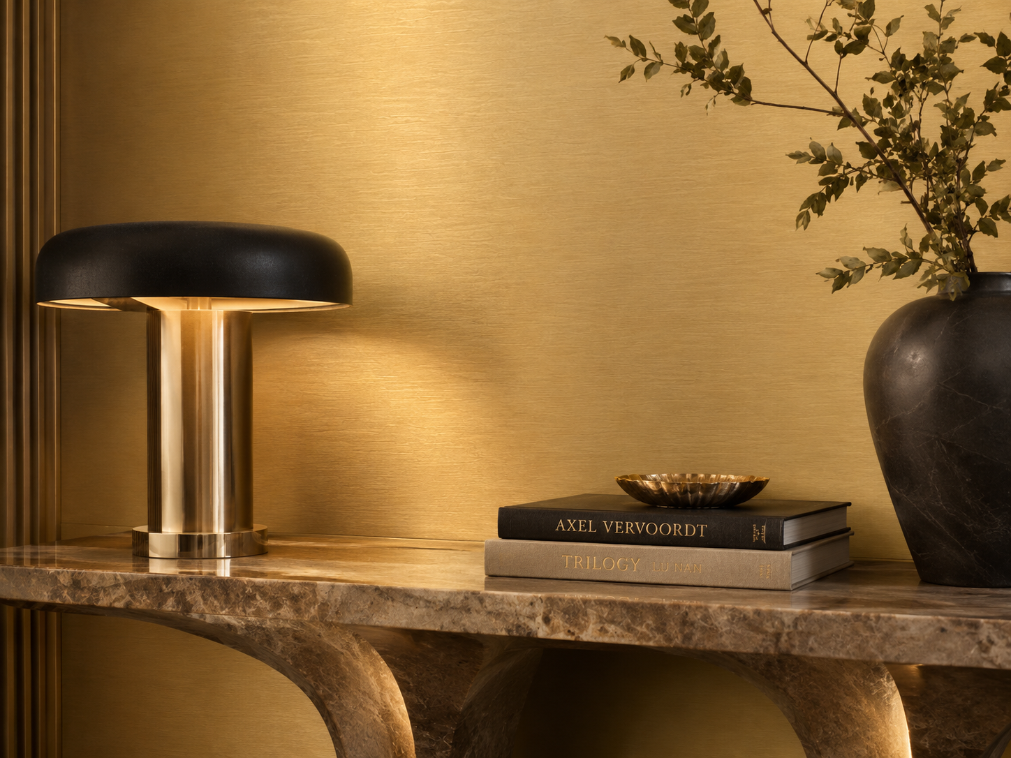 Brushed gold metallic wall panel in a premium interior