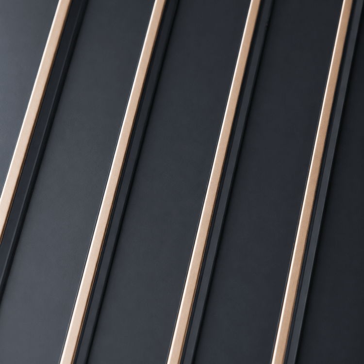 Black wall panels with diagonal thin gold lines, decorative wall cladding for interior accent walls.