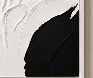 Black and white abstract wall art with textured raised lines and a large black shape in the lower right corner.