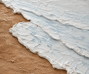 Blush Coast Textured Seascape Wall Art by Wallsmark INC featuring white and tan waves on a sandy beach background.