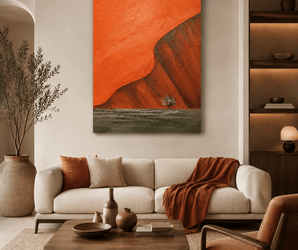 Burnt orange wall art above neutral sofa with earthy throw pillows and accents on shelves in living room.