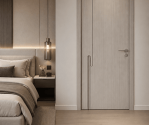 Wallsmark INC Modern Light Oak Interior Door with Metallic Inlay in a bedroom with beige bed and pendant light.