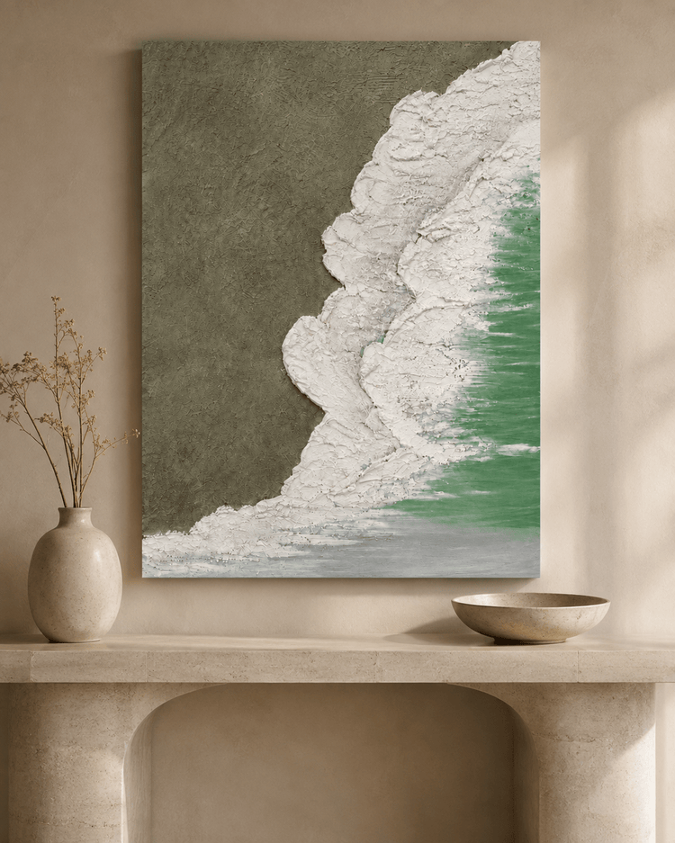 Textured ocean waves wall art with sandy shore above stone console, modern coastal decor for interiors.