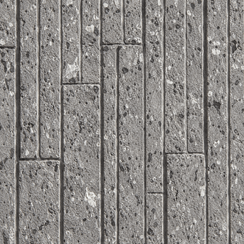 Close-up of the Terraz Soft Stone wall panel featuring textured gray rectangular blocks arranged in a staggered, geometric pattern. The surface displays small pits and speckles, creating a rough and uneven appearance.