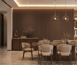 Modern dining room with a wooden table, beige upholstered chairs, pendant lights, decorative plants, and a feature wall adorned with Walnut Noir Fluted PS Wall Panel. The room features marble flooring and warm ambient lighting.