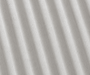 Flexible clay wall tile with diagonal ridges and soft shadows, natural stone texture for wall applications.