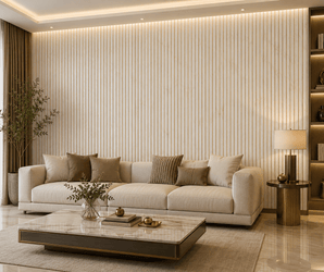 Modern living room with a beige sofa, several throw pillows, a marble coffee table, a tall plant, and built-in shelves with decor and a lamp, all set against elegant White gold slim PS wall panels for an elevated look.