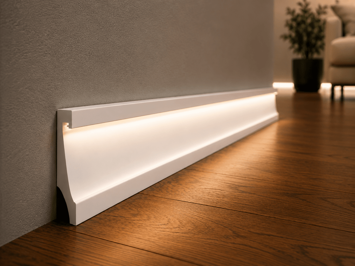 White LED baseboard creating soft indirect light along a modern interior floor