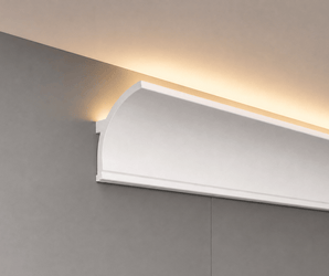 Wallsmark INC White LED Crown Molding on gray feature wall and ceiling, providing a soft white illuminated edge.